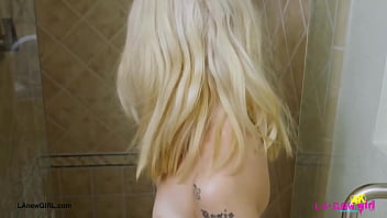 Blonde babe with a killer smile enjoyed a sensual bath