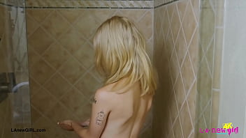 Blonde babe with a killer smile enjoyed a sensual bath