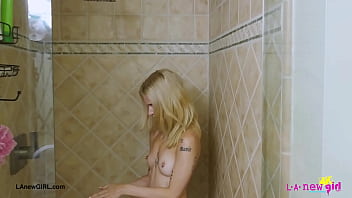 Blonde babe with a killer smile enjoyed a sensual bath