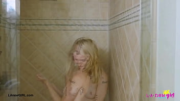 Blonde babe with a killer smile enjoyed a sensual bath