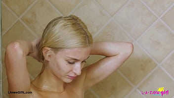 Blonde babe with a killer smile enjoyed a sensual bath