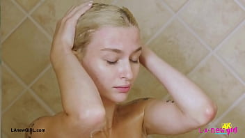 Blonde babe with a killer smile enjoyed a sensual bath
