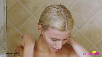 Blonde babe with a killer smile enjoyed a sensual bath