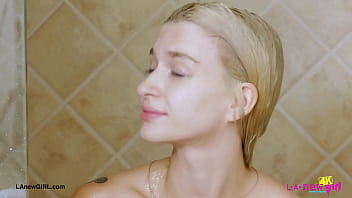 Blonde babe with a killer smile enjoyed a sensual bath