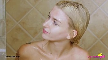Blonde babe with a killer smile enjoyed a sensual bath
