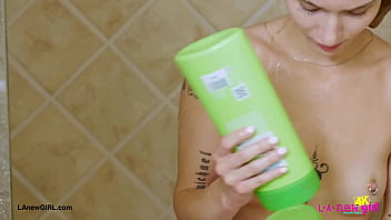 Blonde babe with a killer smile enjoyed a sensual bath