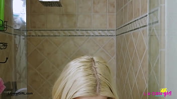 Blonde babe with a killer smile enjoyed a sensual bath