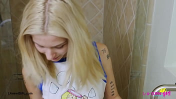 Blonde babe with a killer smile enjoyed a sensual bath