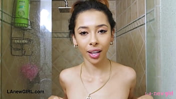 Fresh faced asian stunner enjoys a sensual bath