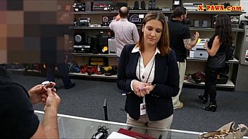 Foxy business lady selling her watch and railed by pawnkeeper