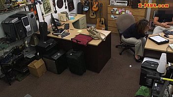 Foxy business lady selling her watch and railed by pawnkeeper