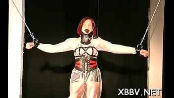 Aphrodisiac woman is using a sex toy at the same time