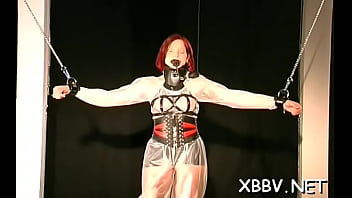 Aphrodisiac woman is using a sex toy at the same time