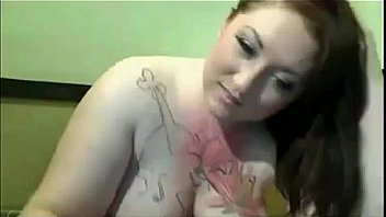 Horny bbw with tattooed big tits toys her cunt