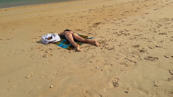 Slender beauty walks along the beach and swims in the sea meet me