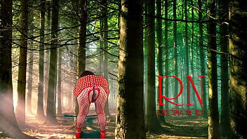 Pin up lady posing in the forest she shows her tits and pussy mesh tights regina noir