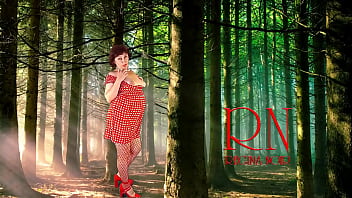 Pin up lady posing in the forest she shows her tits and pussy mesh tights regina noir