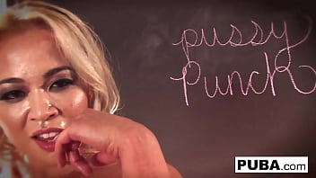 Asian babe rubs her wet pussy