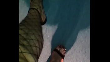 Walking in sexy high heels fishnet stockingd