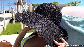 Cute girl in glasses by the pool picked up