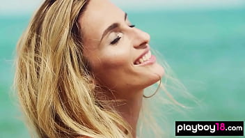 Glamorous all natural blonde muse poses naked at the beach