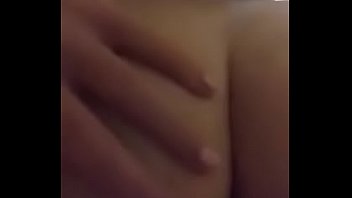 Brunette plays with ass