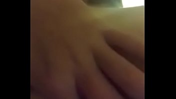 Brunette plays with ass