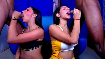 Two street whores give blowjobs