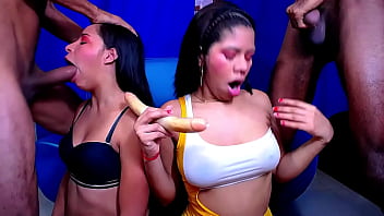 Two street whores give blowjobs