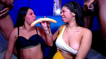 Two street whores give blowjobs