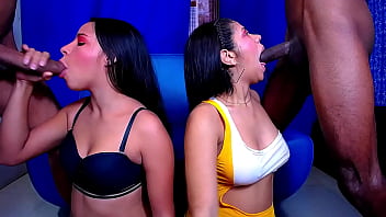 Two street whores give blowjobs