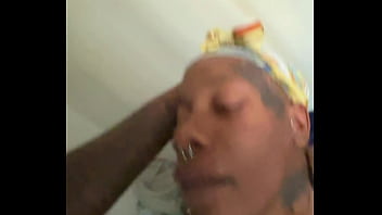 Ebony sucking a huge black cock