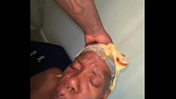 Ebony sucking a huge black cock