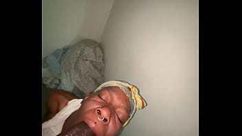 Ebony sucking a huge black cock