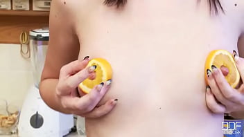 Getting herself orange juicy Getting herself orange juicy