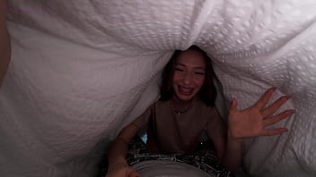 Morning surprise waking him up with kisses under the sheets