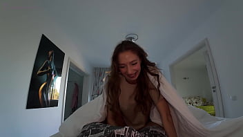 Morning surprise waking him up with kisses under the sheets