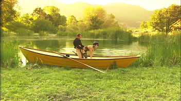 An elegant dame's pussy is squirting while is fucked in the canoe and a few minutes later her partner unloads all over her nylon clad feet