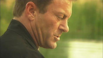 An elegant dame's pussy is squirting while is fucked in the canoe and a few minutes later her partner unloads all over her nylon clad feet