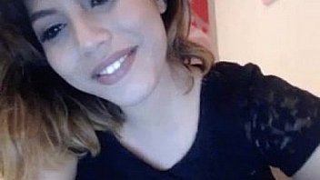 Camgirl showing her big tits while she smile