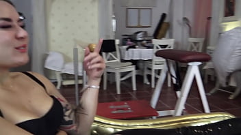 She orders him to loudly inhale the smell of her sweaty stinky feet and verbally humiliates him