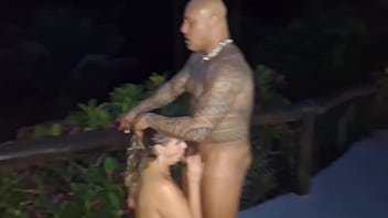 The rock fucks bareback horny milf at the pool of the resort