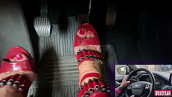 Red high heels driving