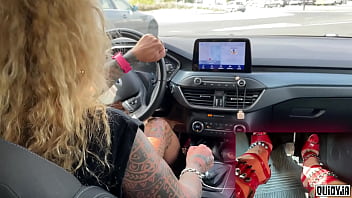 Red high heels driving