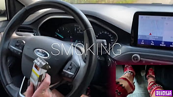 Red high heels driving