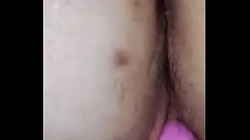 Toying her hairy vag