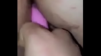 Toying her hairy vag