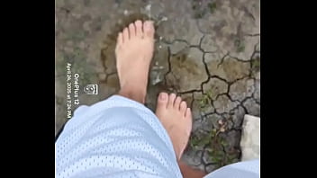 Bare feet playing in the mud