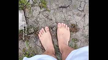 Bare feet playing in the mud