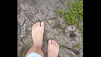 Bare feet playing in the mud